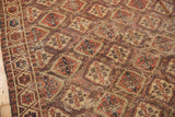 Intricate pattern and textured pile of the antique Beshir rug, showing mostly even wear.