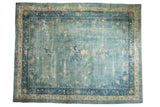 Distressed antique Peking carpet, soothing sky blue, pale gold floral design, indigo border.