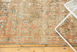 Vintage Distressed Malayer rug, showing worn floral vinery and texture in teal and terracotta.