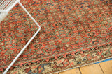 Vintage Hamadan rug: herati motif field and classic border in brick red, ivory.