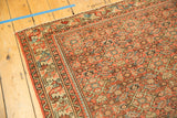 Corner of vintage Hamadan carpet, brick red herati field, and delicate meandering borders.