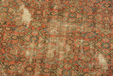 Localized wear on vintage Hamadan rug reveals herati motif and exposed foundation.