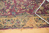 Vintage Lilihan carpet with curvilinear floral vinery, arabesques, and a subtle border restoration.