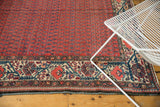 Vintage Malayer Carpet: brick red field, repeating boteh motif, ivory and blue Mir Serbend border.