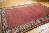 Hand-knotted vintage Malayer rug, rich brick red boteh field, ivory Mir Serbend border.