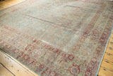 Distressed pile texture and classic turtle samovar border in slate blue-green and wine red.