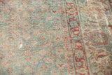 Distressed vintage Herati pattern in slate blue green and wine red.