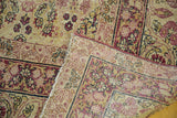 Antique Kerman's cochineal red floral pile showing mostly even wear and woven foundation.