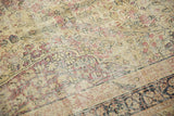 Antique Kerman with mostly even wear, cochineal red florals on ivory field.