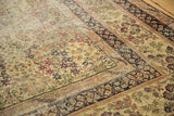 Antique Kerman carpet corner with hand-knotted mil fleur, cochineal red, navy, and soft pile.