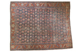 Vintage Heriz carpet features allover boteh pattern, navy blue ground, brick red borders, 7'5