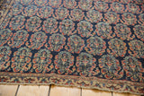 Intricately woven boteh design in navy blue, madder red, and pale gold on a fine antique Afshar rug.