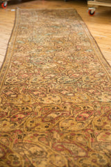 Distressed vintage Malayer runner, intricate allover gold, blush, and powder blue boteh paisley, low pile.