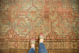 Distressed Ersari carpet, geometric gul motifs with exposed foundation, pale copper and blue.