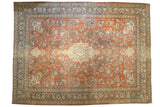 Distressed vintage Mahal carpet with pale rust field, ivory medallion, blue floral motifs. 12x16.