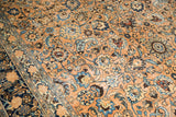 Distressed vintage Meshed rug detail showing worn knot heads, beige field, sky blue palmettes.