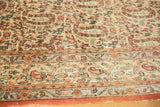 Fine quality vintage Qom carpet detail showcasing rust and pale blue intricate border patterns.