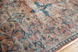 Close-up of distressed Mahal carpet pile, showing scrolling brick red, teal, and ivory floral patterns.
