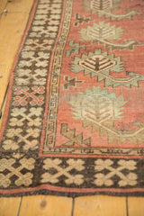 Antique Afghan runner: Oxidized silver boteh on chestnut terracotta, geometric border.