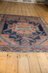 Secured fringe and geometric border detail of the collectible antique Afshar rug, with mostly even wear.