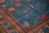 Vintage Khotan carpet from Uzbekistan, sapphire blue field with palmettes, cherry red border.