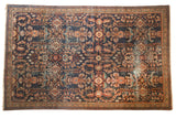 Antique hand-knotted Mahal fragment carpet, allover floral design on navy, terra cotta, and madder red.