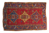 Vintage Turkish rug with cherry red, royal blue purple stepped medallions and serrated border, 3'8