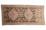 Antique distressed Karabagh runner with double medallion, stylized birds in faded blush and charcoal, 3'11