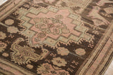 Antique Distressed Karabagh runner featuring faded charcoal, blush rose, and green zigzag pattern.