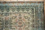 Distressed Hamadan rug corner, Herati Mahi motif, intricate faded powder blue and sand borders.