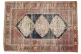 Antique Afshar rug, triple serrated diamond medallions, dark navy and madder red palette, 4' x 5'9