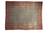 Antique Heriz carpet, early 20th century, with allover navy, red, and ivory germinating boteh motifs.