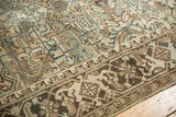 Faded geometric motifs and textured pile on a distressed vintage Mehrivan runner.