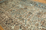 Distressed vintage Mehrivan runner with geometric motifs, textured pile in beige, blue, brown.