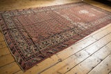Distressed field of a vintage Malayer runner with fading madder red and Mir Boteh.