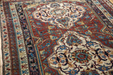 Antique Shirvan carpet's detailed geometric patterns and borders in rich wine red, sky blue, and ivory.