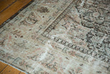 Distressed texture of vintage Mahal carpet, with hard wear and etching.