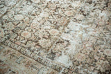 Distressed Mahal carpet with visible hard wear, etched texture, and soft tones.