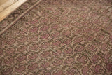 Distressed Malayer rug, close-up of worn pile, faint foundation, and repeating booth motifs.