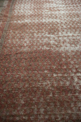 Patinaed Mir Serbend allover boteh pattern in wine red and antique ivory.
