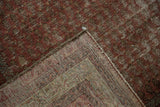 Aged wine red pile and intricate hand-knotted foundation of an antique Mir Serbend carpet.