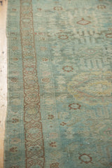 Distressed Hamadan runner with visible knot heads, faded teal, ivory, and coffee brown border.