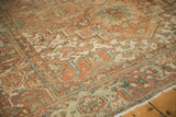 Distressed vintage Heriz carpet border, geometric patterns, low pile, faded bronze and teal.