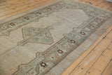 Angled view of the distressed Serab runner's tone-on-tone field and diamond medallion.