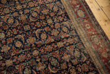 Finely woven Herati pattern and red border in navy, black cherry, and antique ivory.