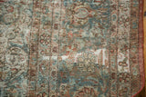 Visible foundation and knot heads on a distressed vintage Kashan, with sky blue and blush red.