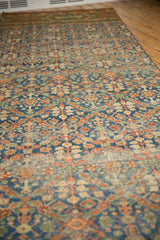 Vintage Laristan rug runner's allover henna pattern in blue, red, ivory; mostly even wear with foundation visible.