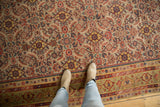 Distressed antique Malayer runner, Herati motif field and border in ivory, pale green, and rust.