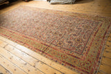 Distressed antique Malayer runner side, showing pale gem green, rust, and Herati motifs.