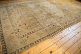 Distressed pile showing allover lotus and scrolling leaf motifs with pawn border.